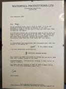 A framed humorous letter from John Cleese to George Gibbs regarding his involvement in the film 'A