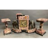 An Art Deco elephant themed pink marble clock and garniture (Pendulum is missing)