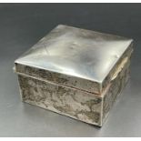 A silver cigarette box, hallmarked for Birmingham 1919 by Williams (Birmingham) Ltd