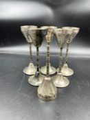 A set of five continental silver (marked 800) glass holders.