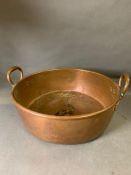 A Large copper cooking pot