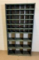 An industrial shelving unit with metal metal pigeon holes (H185cm W92cm D31cm)