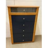 A tall six drawer chest of drawers (H124cm W80cm D40cm)