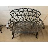 A reclaimed cast iron two seater garden bench with heart scroll detail (H85cm W96cm D42cm)