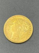 An 1880 Gold Sovereign Coin