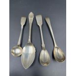 A selection of four hallmarked silver spoons, various makers, style and years.