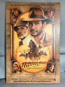 A board backed movie poster from "Indiana Jones and the Last Crusade", framed and glazed 68cm x