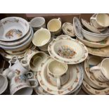 A selection of Wedgwood and Royal Doulton nursery ware to include plates, bowls and mugs