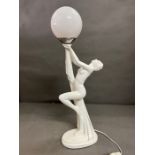 An Art Deco Biba style lamp with opaline globe