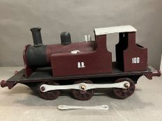 A wooden model steam train AF