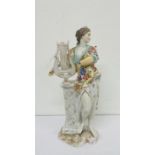 An antique porcelain figure of a classical women with harp AF