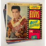 Nine Elvis records and two London Symphony orchestra classic rock and The Queen collection, one