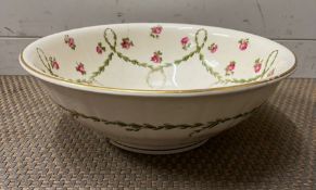 A Victorian wash bowl with rose and swag decoration