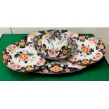 A large ironstone meat platter, a lidded pot and two plates with deony and prunus pattern