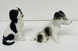 Two china dog figures