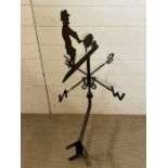 A rustic weather vane