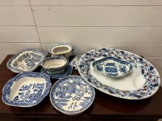 A selection of blue and white china platters and serving dishes