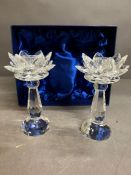 Two boxed crystal candle sticks