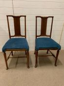 A pair of side chairs
