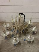 An eight arm glass chandelier