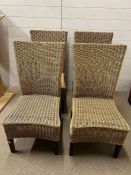 Four wicker dining chairs