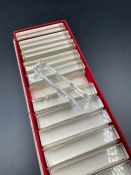 A boxed set of twelve knife rests some by Baccarat