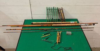 A selection of fishing rods, etc