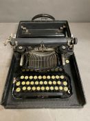 A Vintage Corona typewriter by the J C Smith & Corona Typewriter Inc