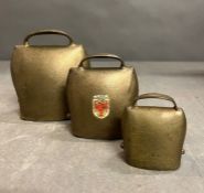 Three vintage cow bells