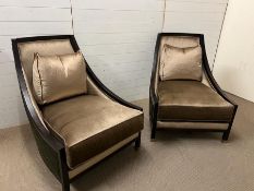 A pair of occasional chairs with curve frame ending with chrome caps, upholstered in silk velvet and