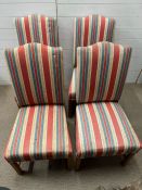 Four upholstered dining chairs with striped fabric