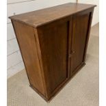 A mahogany cabinet opening to reveal what could of been the top of a bureau/secretaries (H58cm W56cm