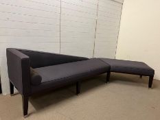 A 20th century chaise with sleek clean design on hardwood frame terminating with chrome caps