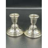 A Pair of hallmarked silver squat candlesticks, Birmingham 1965 by Sanders & Mackenzie