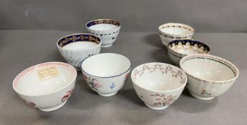 A selection of eight porcelain 18th century tea bowls, Worcester, New Hall and Caughley