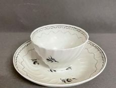 18th Century Caughley floral spiral fluted tea bowl and saucer.