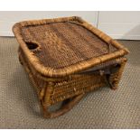 A vintage wicker fish man or country state picnic seat