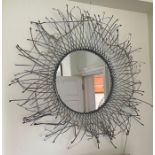 A contemporary wire frame circular mirror (Dia110cm)