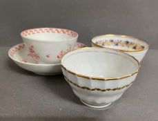 Three New Hall tea bowls and a saucer