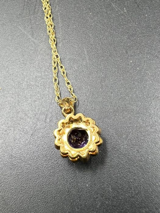 A 9ct gold necklace with diamond and semi precious stone pendant (Total Weight 1.6g) - Image 5 of 5