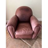 A soft leather Easy armchair Condition Report no splits or rips underneath seat cushions ripped,