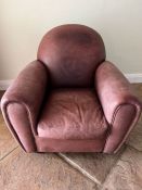 A soft leather Easy armchair Condition Report no splits or rips underneath seat cushions ripped,