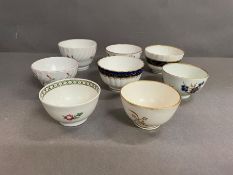 A selection of eight porcelain 18th century tea bowls