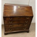 An oak bureau (H103cm W92cm D49cm)