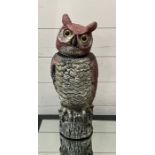 A plastic garden owl