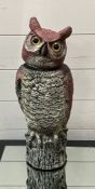 A plastic garden owl