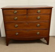 A two over three chest of drawers with brass embossed handles (H104cm W120cm D54cm)