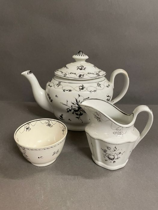 A New Hall, black and white teapot, jug and tea bowl