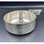 A Bailey Banks & Biddle Sterling silver children's bowl with performing animal decoration (Total