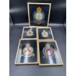 A selection of five Military Airforce framed badges.